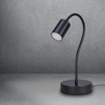 Lampada LED Livarno Home con braccio orientabile, dettaglio luce bianca calda accesa su sfondo grigio texture