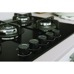 Piano cottura Indesit ING 72T BK 1, dettaglio bruciatori e manopole con icone di regolazione fiamma