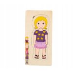 Puzzle corpo umano educativo in legno Playtive bambina, vista frontale con primo strato completo vestita
