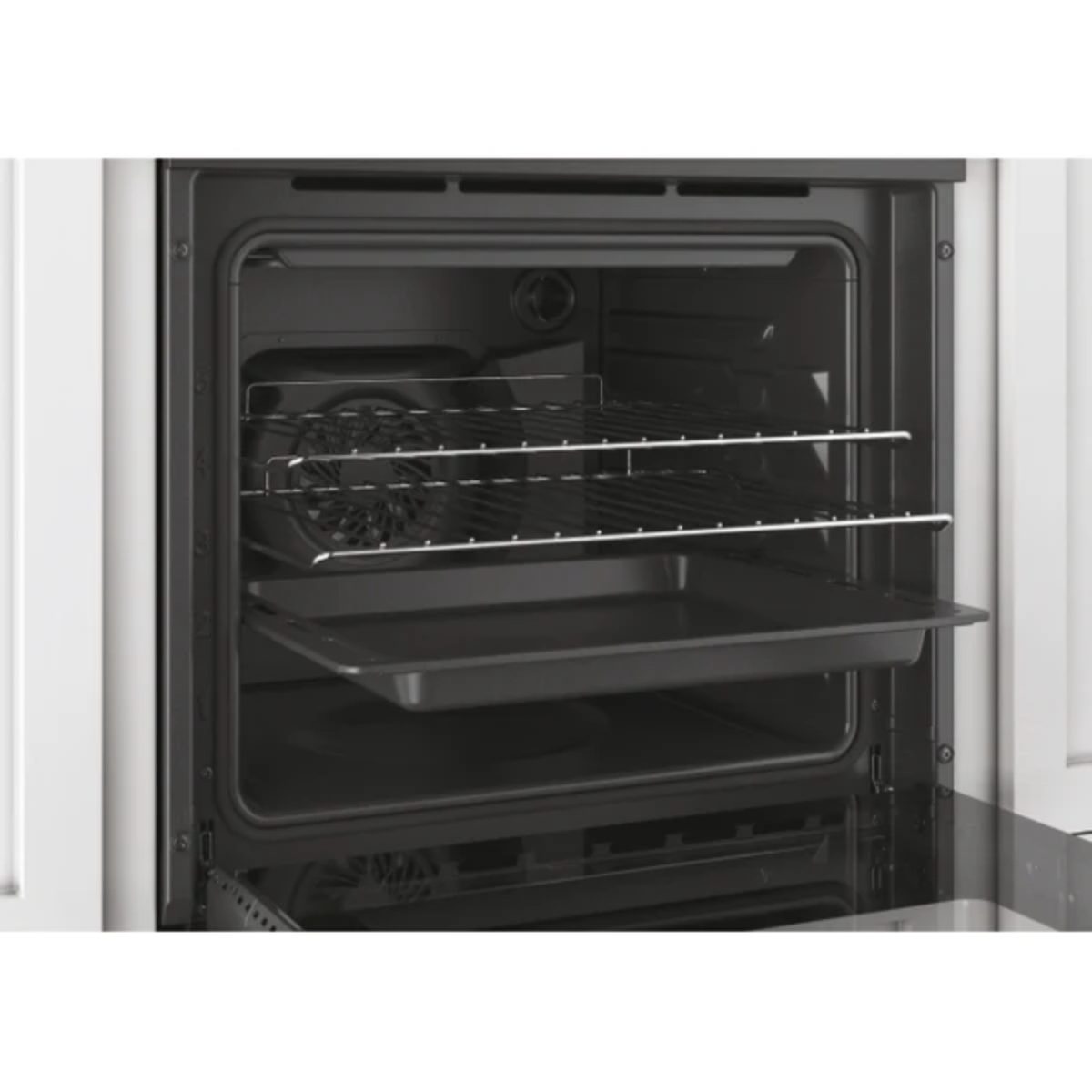 Forno Candy Classic FCC604GH/E 65L incassato con sportello aperto, vista interna cavità con griglie e leccarda