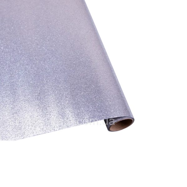 Carta Regalo Argento Glitterato 70x150cm, rotolo aperto con dettaglio texture brillante e tubo interno