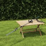 Parkside PHESL 800 ricondizionato appoggiato su tavolo da giardino, impugnatura e cavo visibili