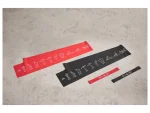 Crivit fasce elastiche resistenza fitness su sfondo texture, quattro bande rosse e nere con grafiche esercizi